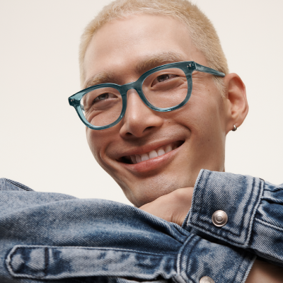 Man wearing blue glasses